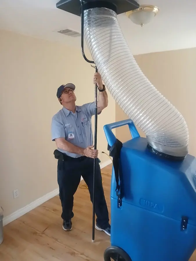 Mini Split Installation technician using HEPA equipment in Grandville